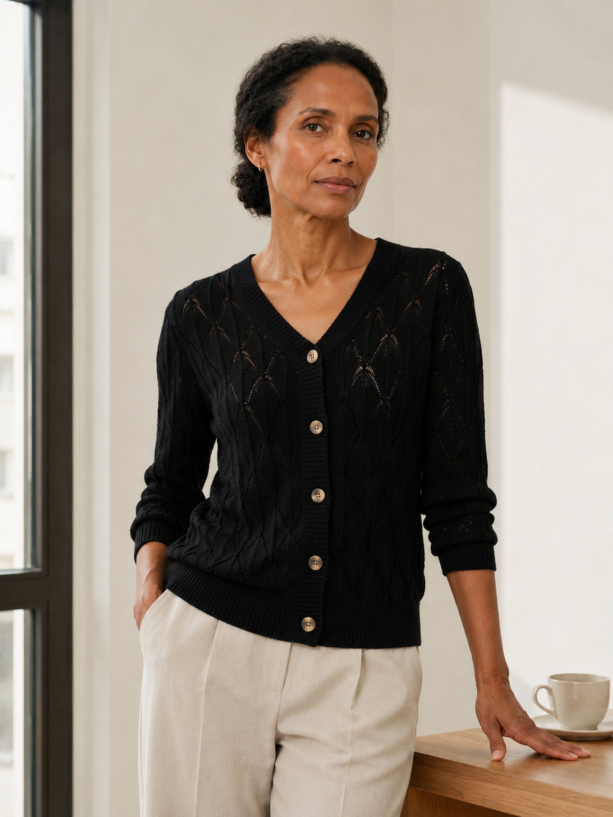 MY021 black openwork v-neck three-quarter sleeve cardigan front model view