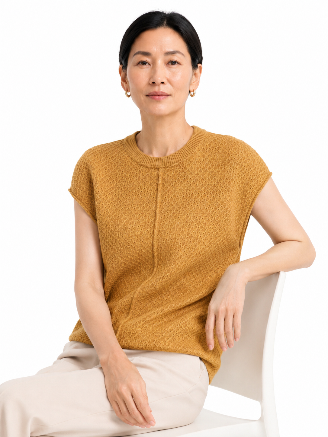 MY017 yellow textured sleeveless sweater tank seated model view