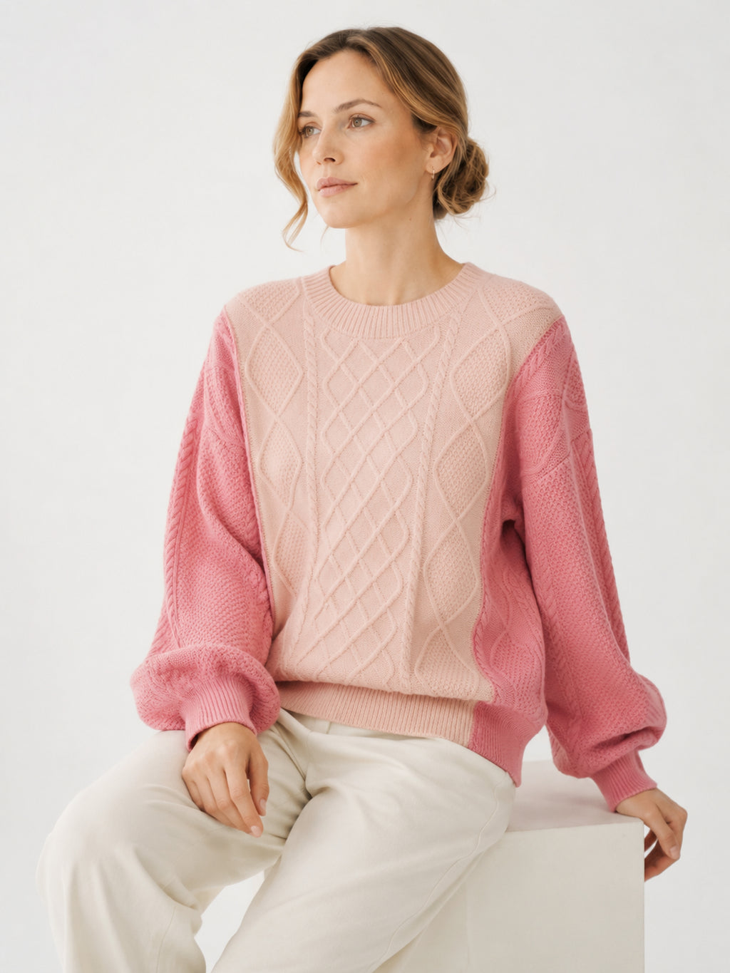MY005 soft pink textured cable-knit pullover sweater seated model view