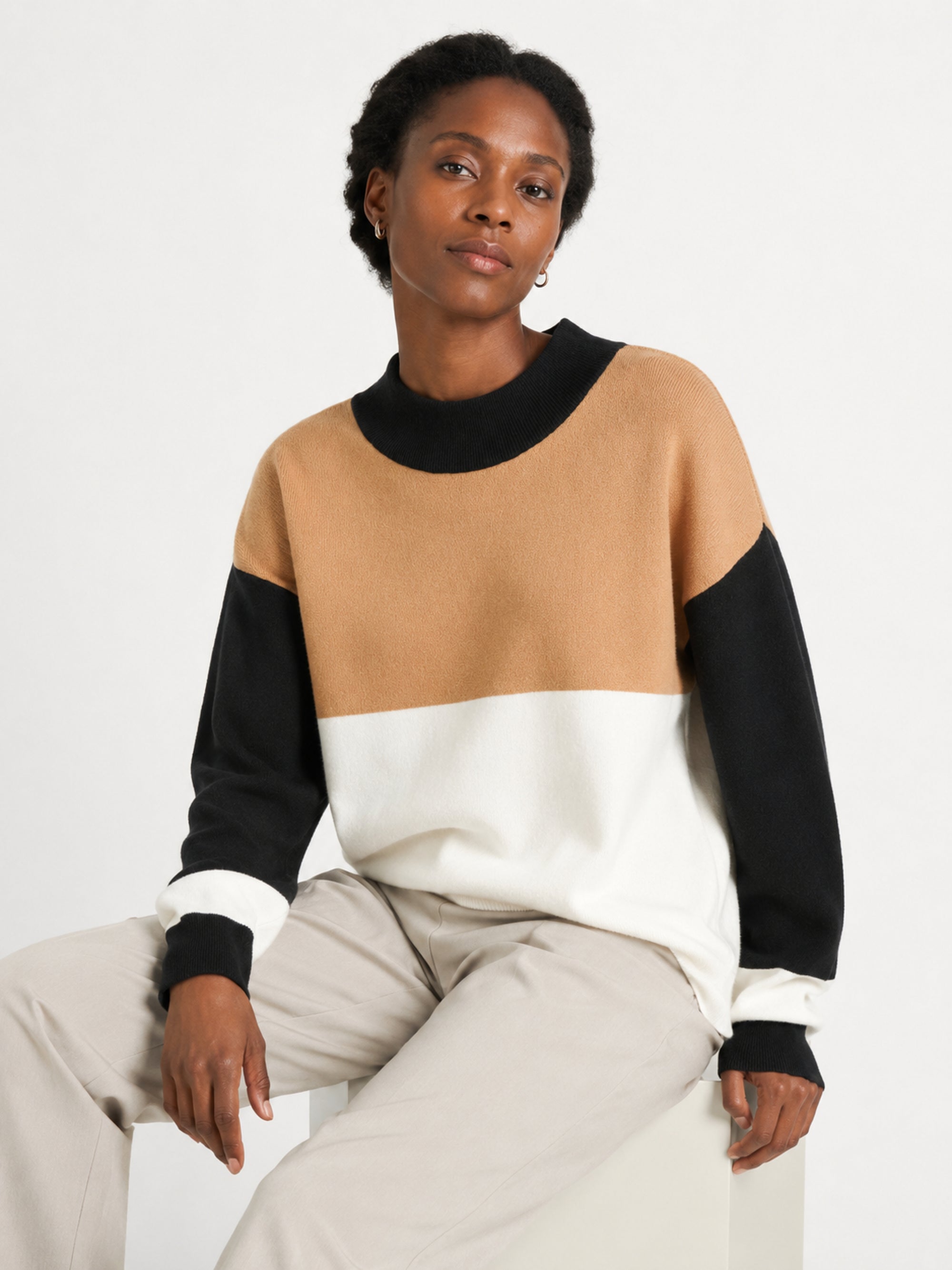 MY007 khaki wide-neck striped knit pullover seated model view
