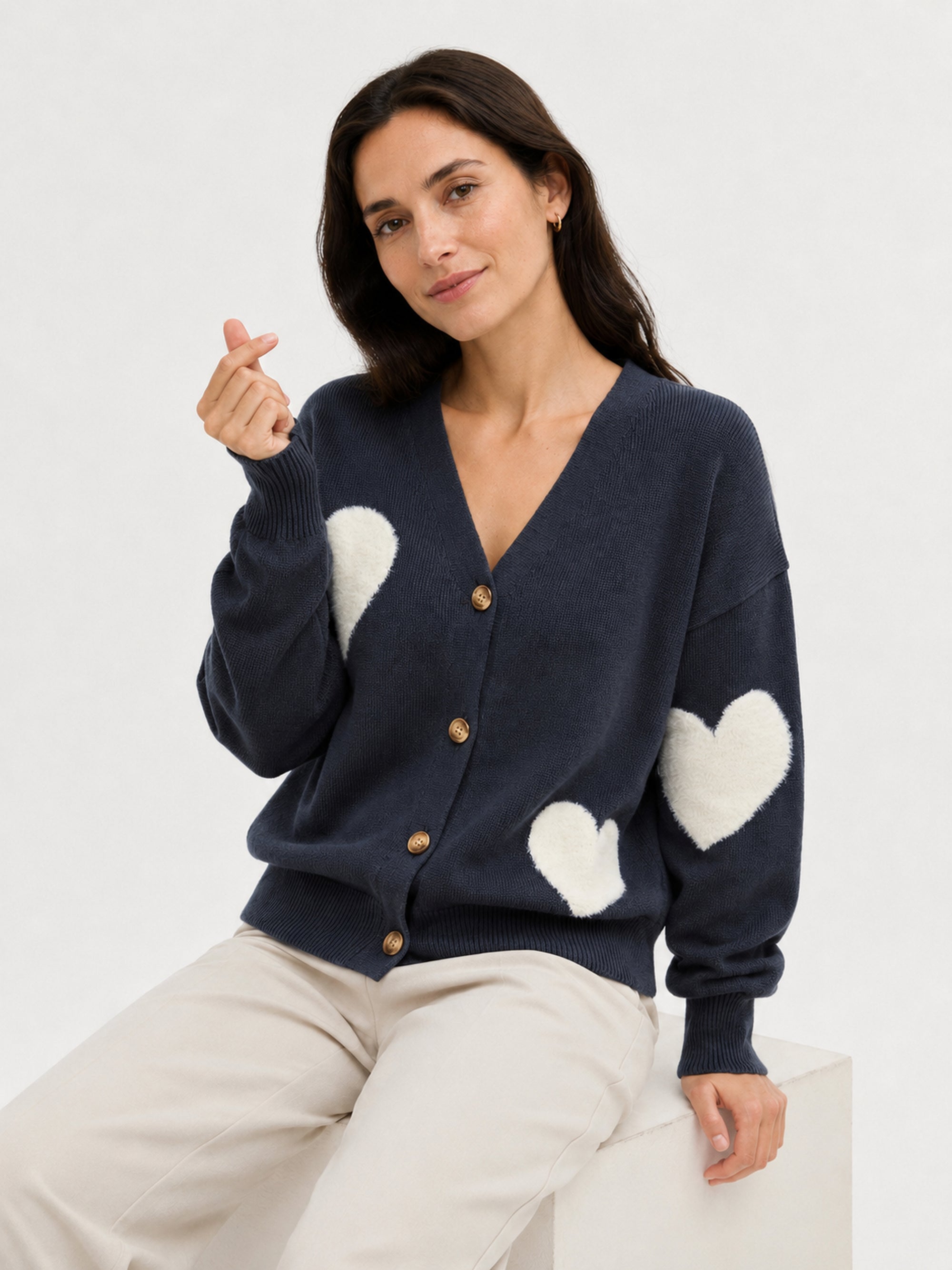 MY014 blue oversized jacquard knit cardigan seated model view