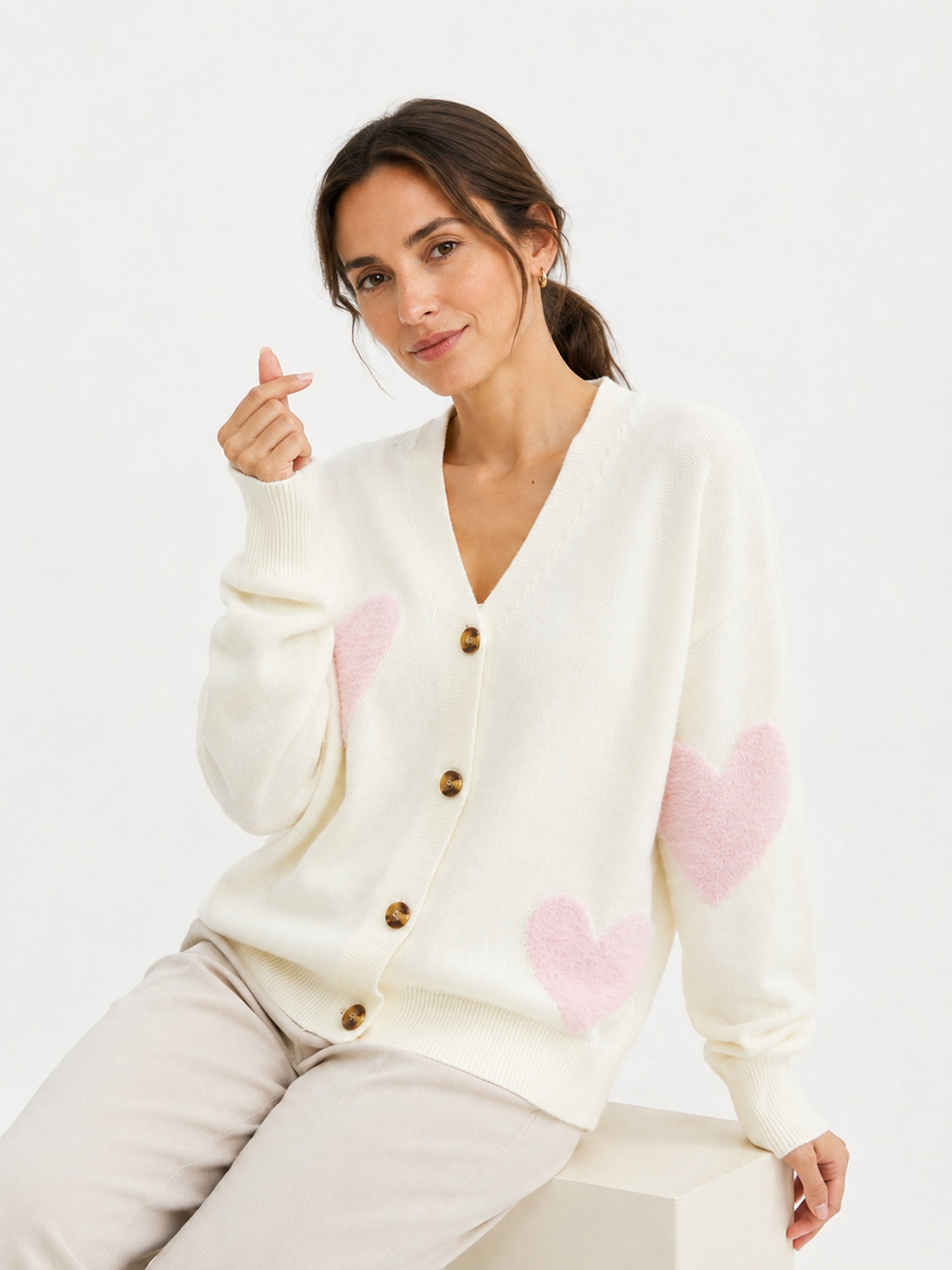MY014 white oversized jacquard knit cardigan seated model view