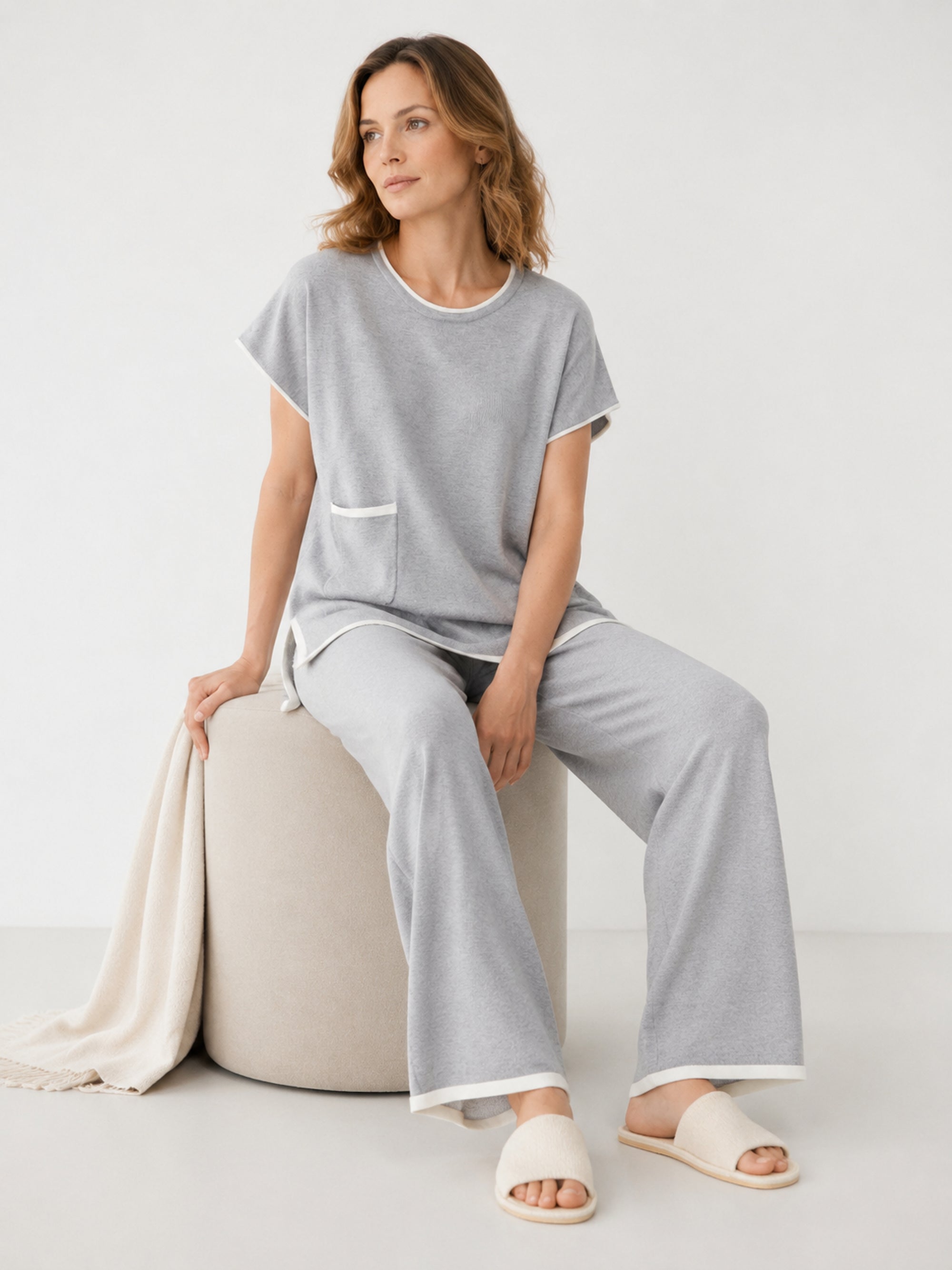 MY001 gray contrast-trim sleeveless knit set seated model view