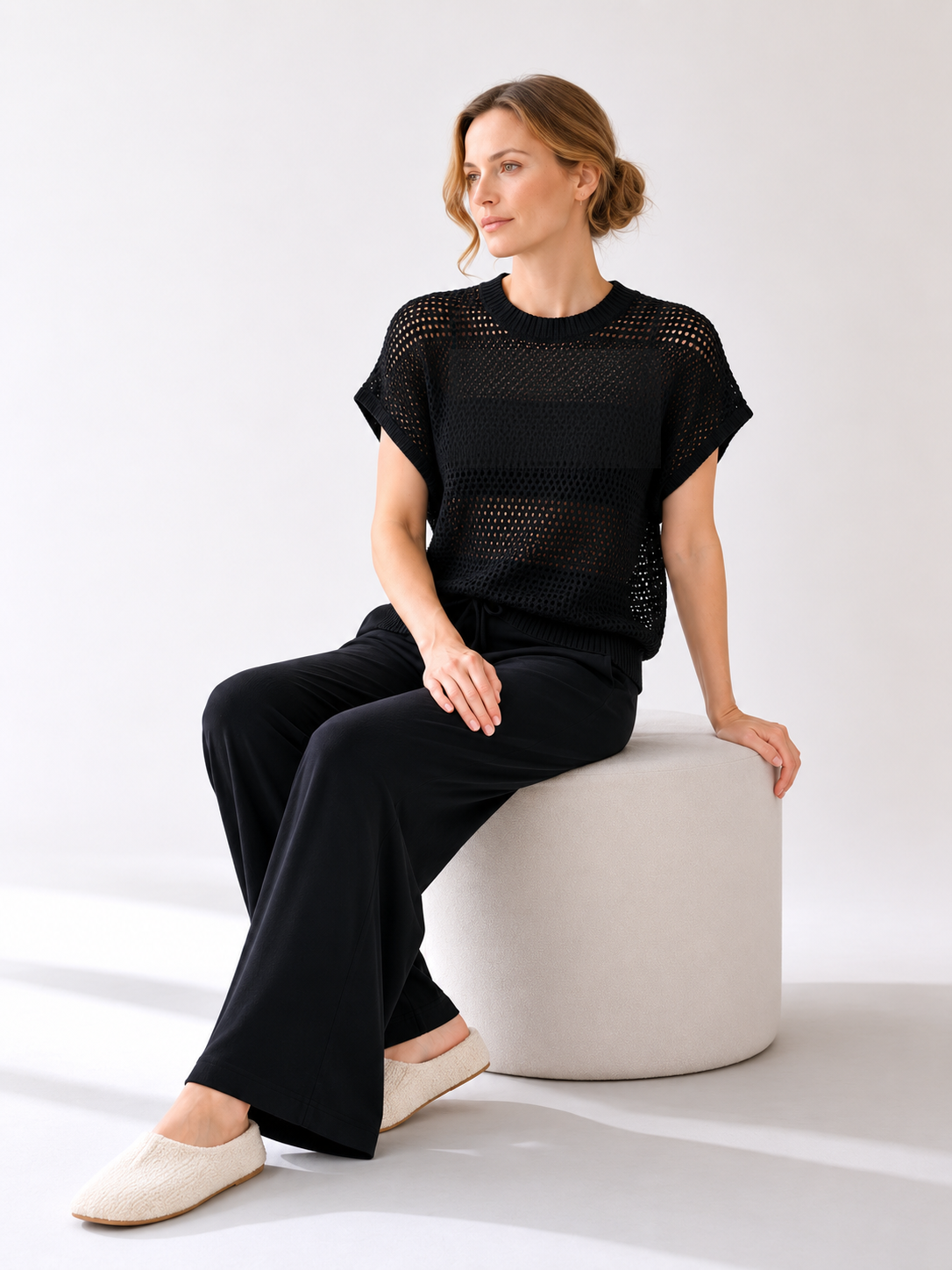 MY010 black open-knit sleeveless top & pants set seated model view