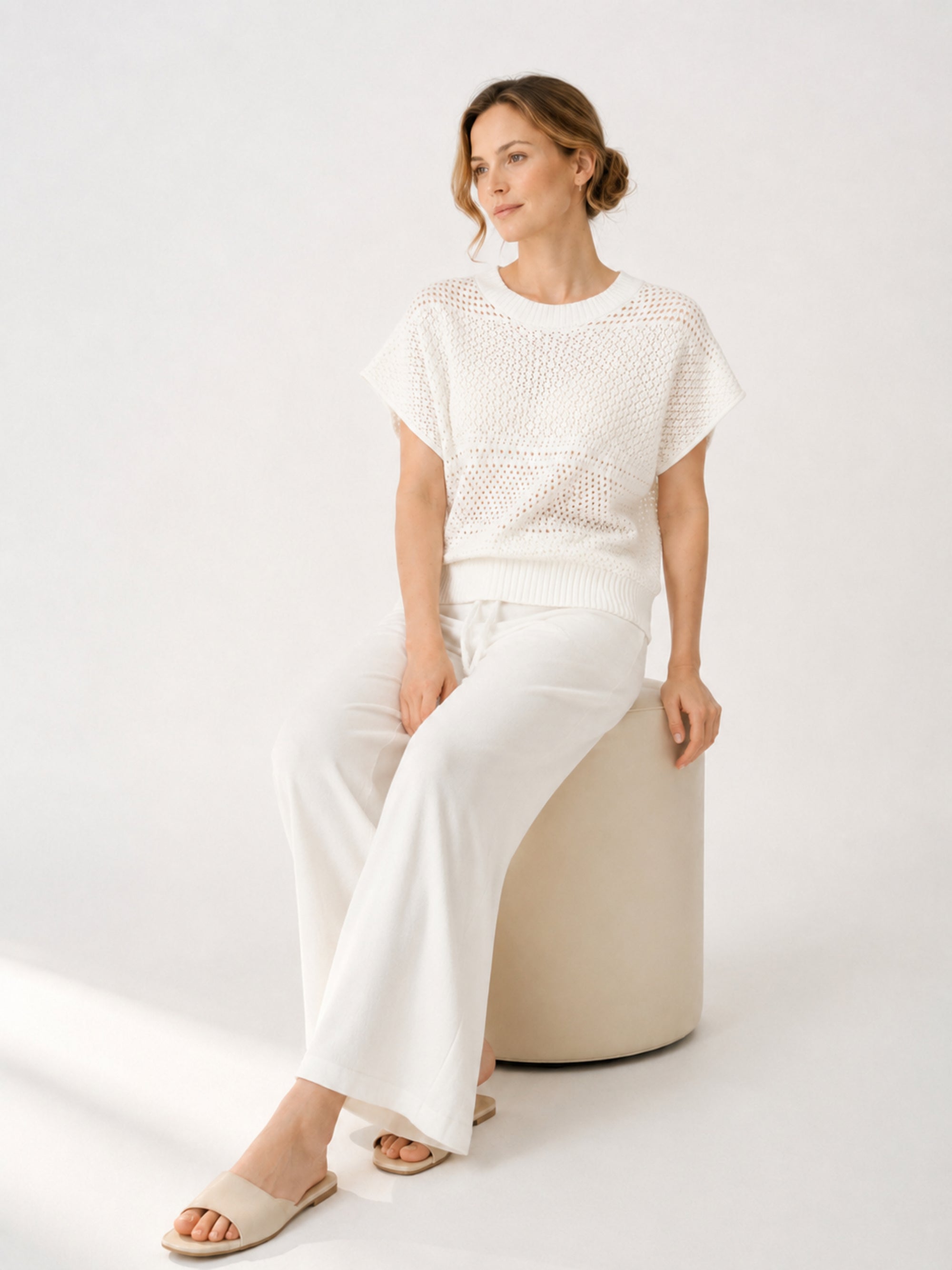 MY010 white open-knit sleeveless top & pants set seated model view