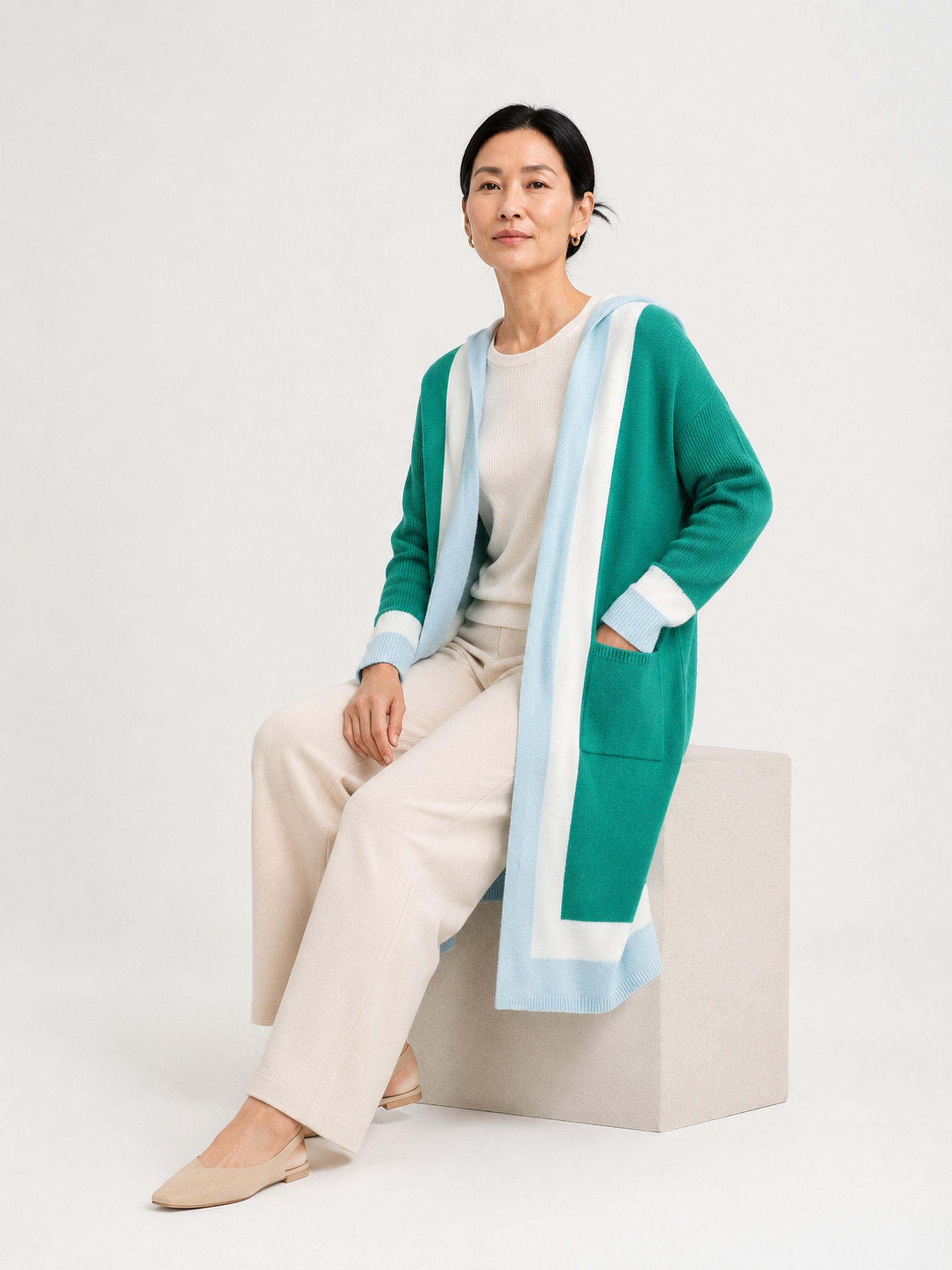 MY004 green hooded long knit cape cardigan seated model view