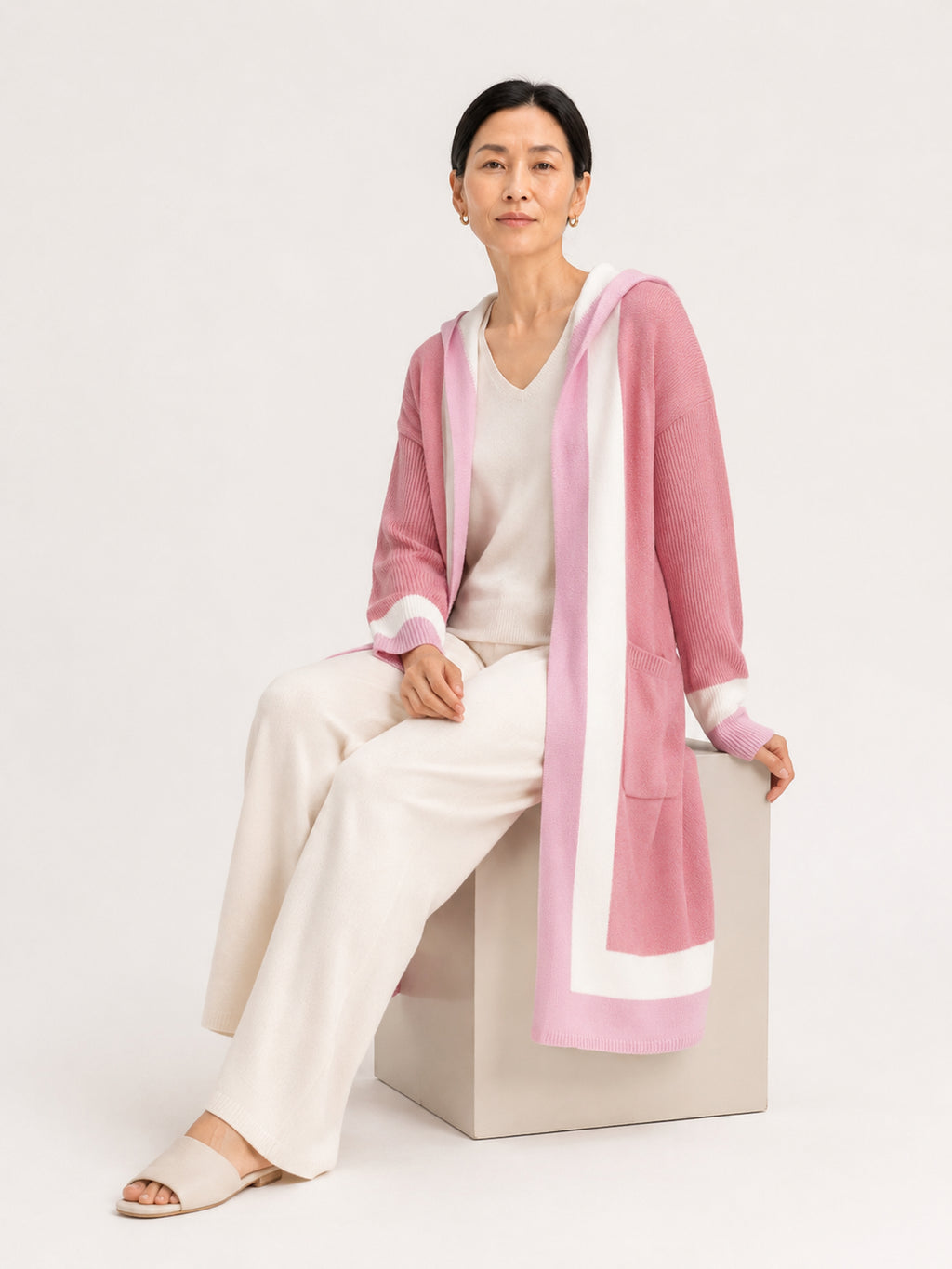 MY004 soft pink hooded long knit cape cardigan seated model view