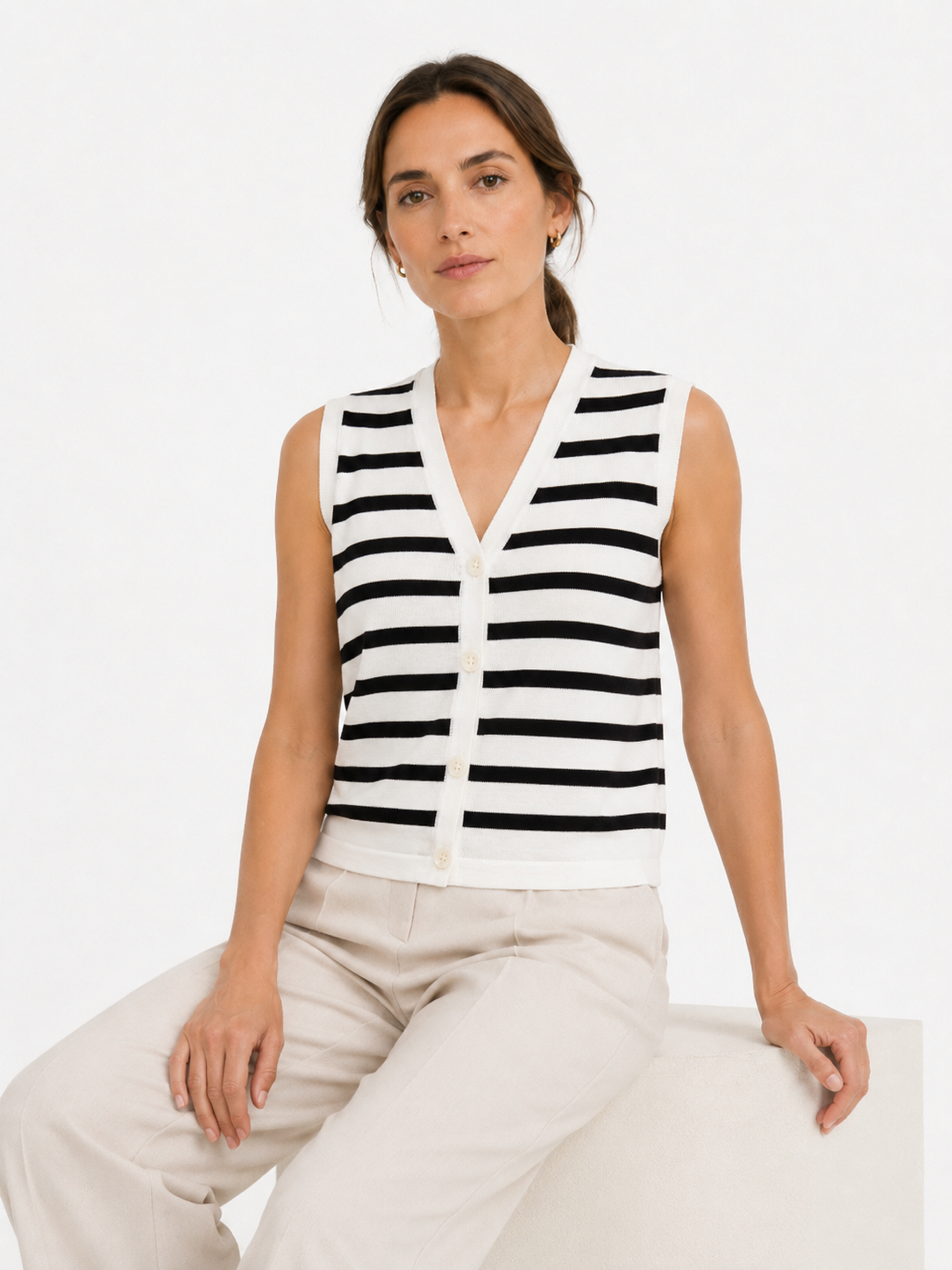 MY018 white striped sleeveless knit cardigan vest seated model view