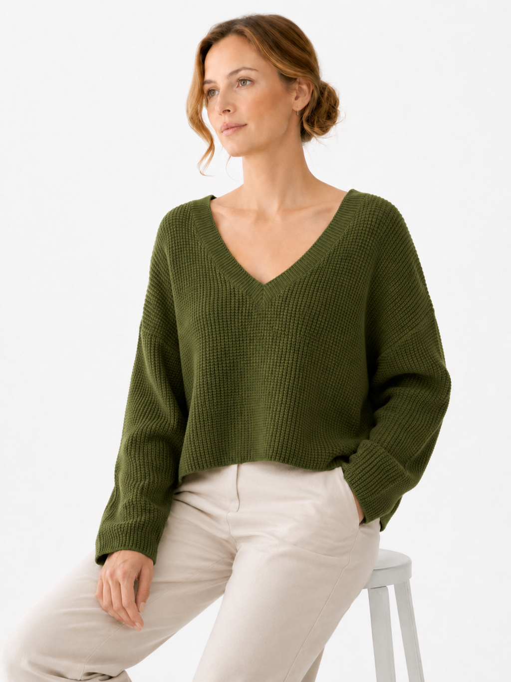 MY016 green cropped v-neck knit sweater seated model view