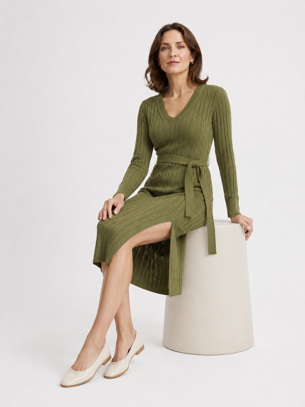 MY011 green v-neck belted knit dress seated model view