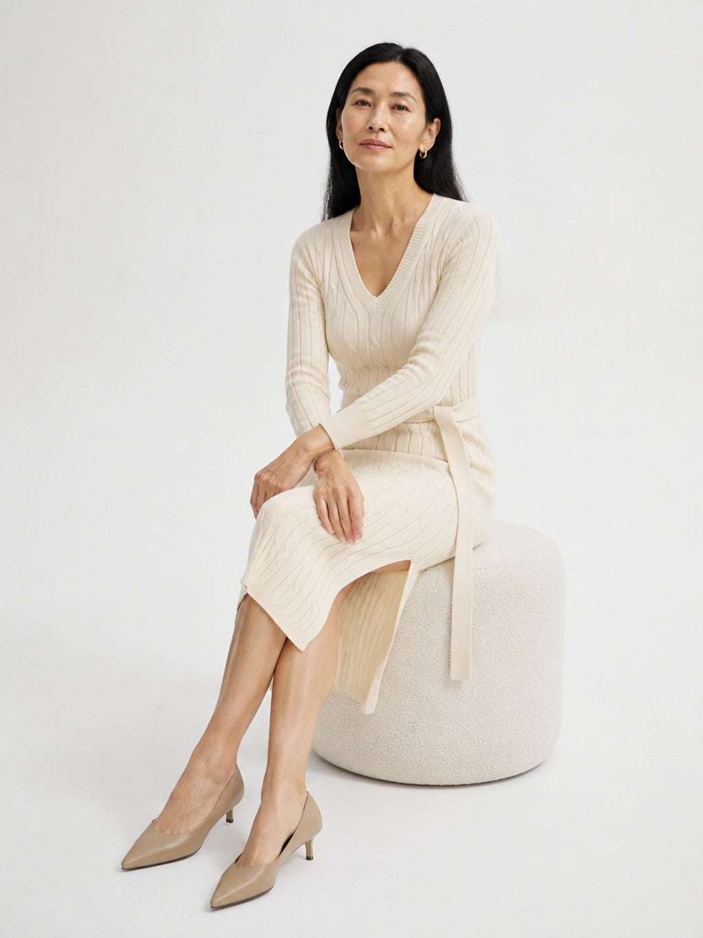 MY011 ivory v-neck belted knit dress seated model view